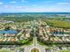 Aerial view of the community showing various houses and landscape at 5201 Highbury Cir, Sarasota, FL 34238