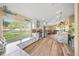 Open kitchen with stainless steel appliances and a built-in breakfast bar at 5201 Highbury Cir, Sarasota, FL 34238