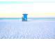 Scenic beach view with a blue lifeguard stand and soft sand at 5201 Highbury Cir, Sarasota, FL 34238