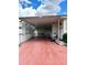 Covered carport with access to the manufactured home at 3311 Overcup Oak Ter, Sarasota, FL 34237