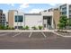 Exterior of community clubhouse with dedicated parking, providing a central hub for residents at 1703 N Tamiami Trl # 302, Sarasota, FL 34234
