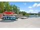 Dock area featuring ample kayak and paddleboard storage, offering access to waterfront activities at 1703 N Tamiami Trl # 302, Sarasota, FL 34234