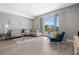 Bright living room with sleek furniture and balcony access at 1703 N Tamiami Trl # 302, Sarasota, FL 34234