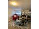 A well-organized closet featuring shelving for shoes, handbags and accessories, and a stylish glass table at 3375 8Th St, Sarasota, FL 34237