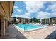 Refreshing community swimming pool with lounge chairs at 505 30Th W Ave # E304, Bradenton, FL 34205