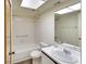 Clean bathroom with tub, toilet and vanity at 505 30Th W Ave # E304, Bradenton, FL 34205