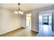 Bright dining room with wood-look floors at 505 30Th W Ave # E304, Bradenton, FL 34205