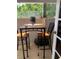 Private patio with table and chairs, perfect for relaxing at 3375 8Th St, Sarasota, FL 34237