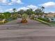 Community entrance with landscaping and signage at 4145 Reflections Pkwy, Sarasota, FL 34233