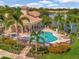 Resort-style community pool with a clubhouse and hot tub at 4145 Reflections Pkwy, Sarasota, FL 34233