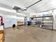 Garage with workbench, shelving, and storage space at 4145 Reflections Pkwy, Sarasota, FL 34233