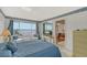 Main bedroom with water views and access to another room at 8911 Midnight Pass Rd # 410, Sarasota, FL 34242