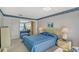 Bedroom with water view and mirrored closet at 8911 Midnight Pass Rd # 410, Sarasota, FL 34242