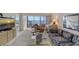 Living room with water views and access to balcony at 8911 Midnight Pass Rd # 410, Sarasota, FL 34242