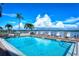 Relaxing community pool overlooking the calm waters at 8911 Midnight Pass Rd # 410, Sarasota, FL 34242