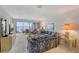 Spacious living room with water views and comfortable seating at 8911 Midnight Pass Rd # 410, Sarasota, FL 34242
