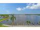 Stunning view of waterfront with private docks and resort amenities at 8911 Midnight Pass Rd # 410, Sarasota, FL 34242