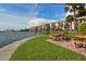 Enjoy this scenic waterfront view with brick picnic tables at 8911 Midnight Pass Rd # 410, Sarasota, FL 34242