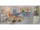 Spacious living room featuring a comfy sectional sofa and carpet flooring at 8911 Midnight Pass Rd # 410, Sarasota, FL 34242
