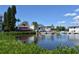 Stunning waterfront view of the marina and local restaurants at 8911 Midnight Pass Rd # 410, Sarasota, FL 34242