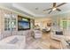 Living room with built-in entertainment center and comfortable seating at 350 River Enclave Ct, Bradenton, FL 34212