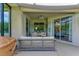 Spacious screened patio with comfortable seating and access to the interior at 350 River Enclave Ct, Bradenton, FL 34212