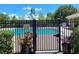 Community swimming pool area with gate and signage at 7365 Black Walnut Way, Lakewood Ranch, FL 34202