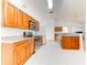 Kitchen boasts granite counters, stainless steel appliances, and wood cabinets at 4005 Belladonna Ave, North Port, FL 34286