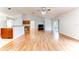 Bright living room with hardwood floors and view to kitchen at 4005 Belladonna Ave, North Port, FL 34286
