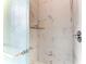 Shower with marble-look walls and glass door at 4005 Belladonna Ave, North Port, FL 34286