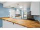Kitchen with butcher block countertops and stainless steel appliances at 5412 11Th Street E Cir # 41, Bradenton, FL 34203