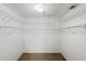 Walk-in closet with ample shelving and storage space, ready to be organized at 5412 11Th Street E Cir # 41, Bradenton, FL 34203