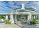 Outdoor patio with fireplace and seating area at 14551 Skipping Stone Loop, Parrish, FL 34219