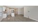 Modern kitchen with white cabinets and island at 14551 Skipping Stone Loop, Parrish, FL 34219