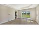 Bright office with sliding glass doors leading to a backyard view at 14551 Skipping Stone Loop, Parrish, FL 34219