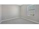 Spacious bedroom with neutral walls and carpet flooring at 14551 Skipping Stone Loop, Parrish, FL 34219