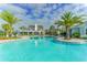 Inviting community pool with a spacious deck at 14551 Skipping Stone Loop, Parrish, FL 34219