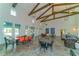 Bright community room with high ceilings and seating areas at 14551 Skipping Stone Loop, Parrish, FL 34219
