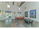 Community room with seating areas, large windows, and high ceilings at 14551 Skipping Stone Loop, Parrish, FL 34219