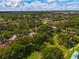 Community overview showcasing lush landscaping and various housing styles at 19505 Quesada Ave # B204, Port Charlotte, FL 33948