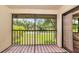 Relaxing screened balcony offering tranquil outdoor space at 19505 Quesada Ave # B204, Port Charlotte, FL 33948