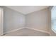 Spacious bedroom with window and neutral wall color at 14705 Barefoot Ln, Parrish, FL 34219