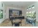 Community kitchen with an island, modern appliances, and stylish tile at 14705 Barefoot Ln, Parrish, FL 34219