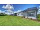 Houses with screened lanais and grassy backyard at 14705 Barefoot Ln, Parrish, FL 34219