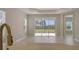 Dining room with sliding glass doors and view of backyard at 14705 Barefoot Ln, Parrish, FL 34219