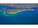 Aerial view of coastline, showcasing beaches and residential areas at 6157 Midnight Pass Rd # G11, Sarasota, FL 34242