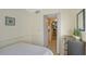 Cozy bedroom with a double bed and built-in dresser at 6157 Midnight Pass Rd # G11, Sarasota, FL 34242