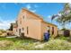 Tan house with balcony and backyard at 6515 Mauna Loa Blvd, Sarasota, FL 34241