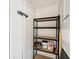 Storage area with shelving unit for tools and supplies at 5412 11Th Street E Cir # 41, Bradenton, FL 34203