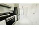 Modern kitchen with stainless steel appliances and granite countertops at 18875 Ashcroft Cir, Port Charlotte, FL 33948